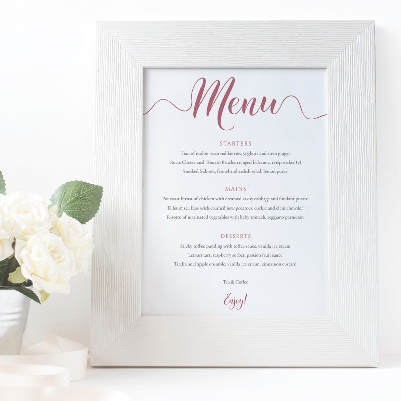 dusty pink wedding menu in a white frame