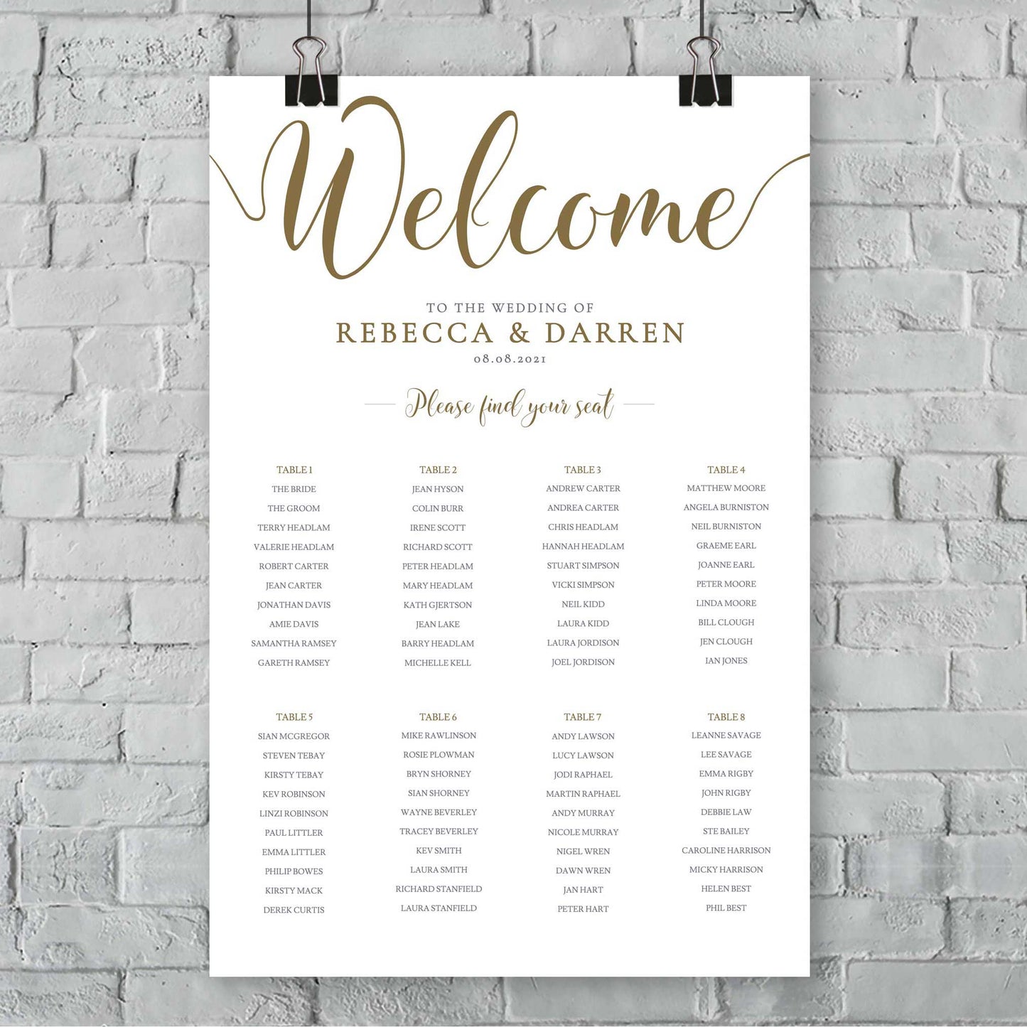 elegant gold wedding seating plan with 8 tables on a wall