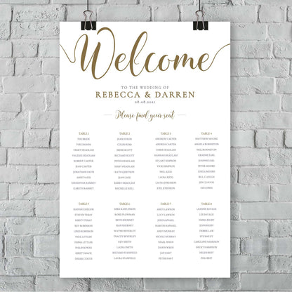 elegant gold wedding seating plan with 8 tables on a wall
