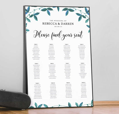12 table seating plan with eucalyptus leaves printed in a black picture frame