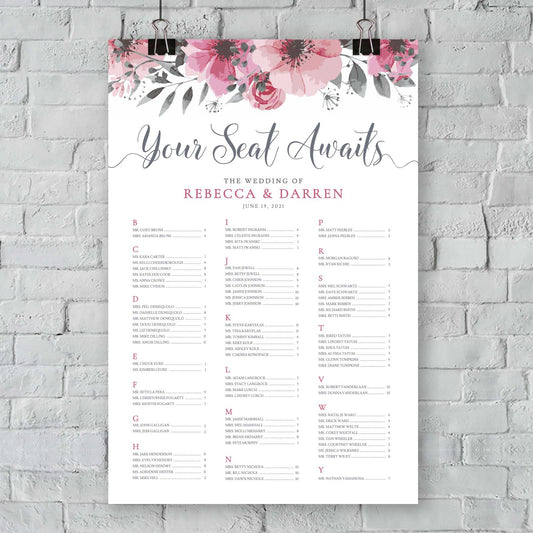 24x36 pink floral alphabetical seating chart hanging from an outdoor wall