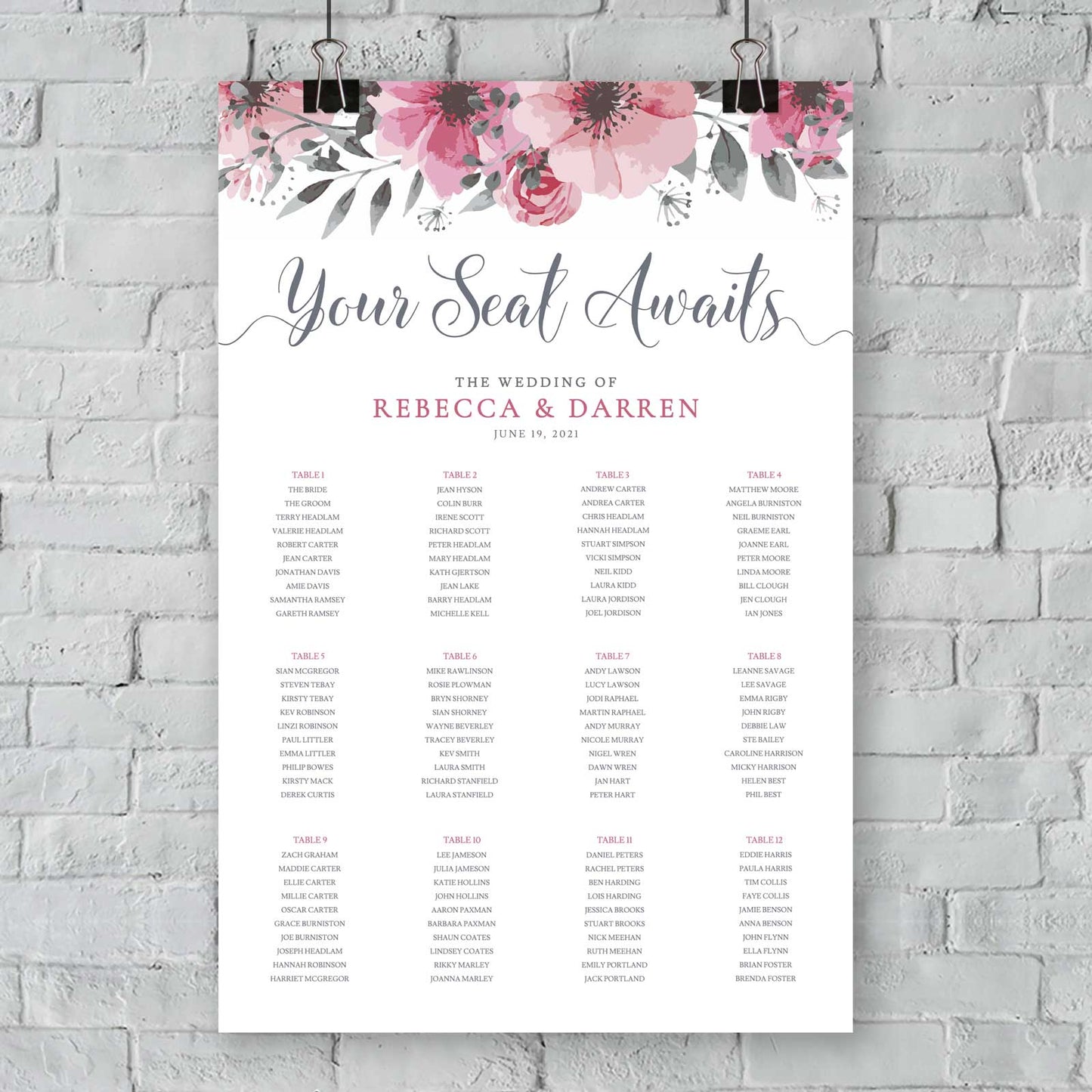 floral seating chart with 12 tables, bride and grooms name and wedding date
