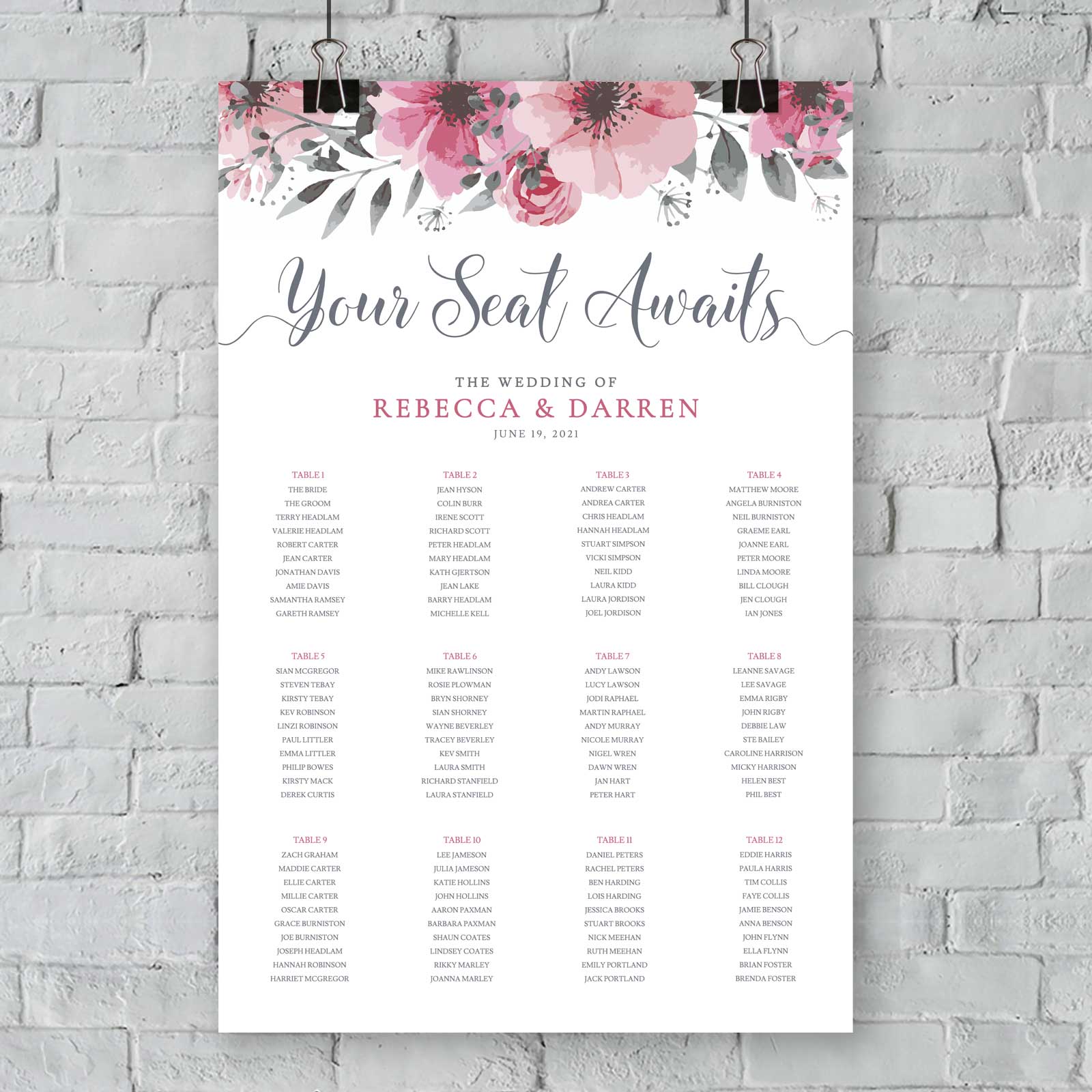 floral seating chart with 12 tables, bride and grooms name and wedding date