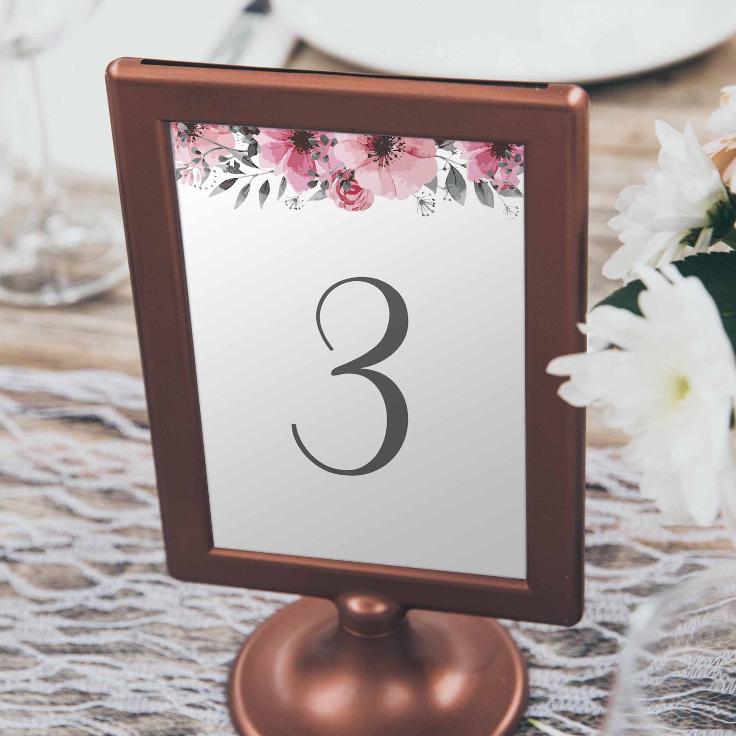floral table numbers showing wedding table decor