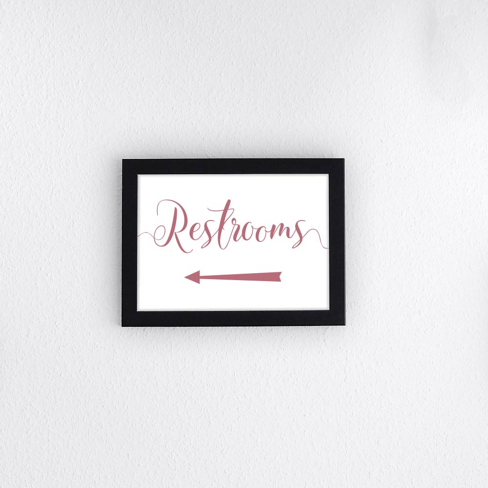 fuchsia pink wedding restrooms directional arrow sign in a frame