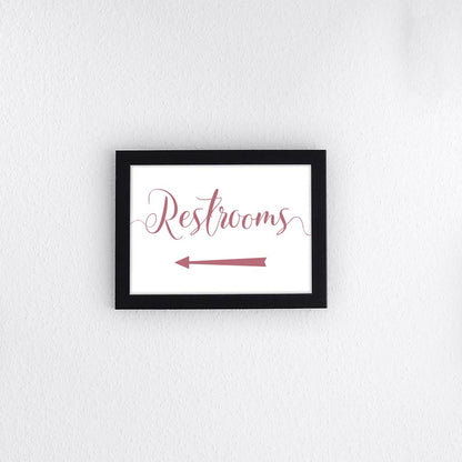 fuchsia pink wedding restrooms directional arrow sign in a frame