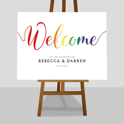 gay pride welcome sign on an easel