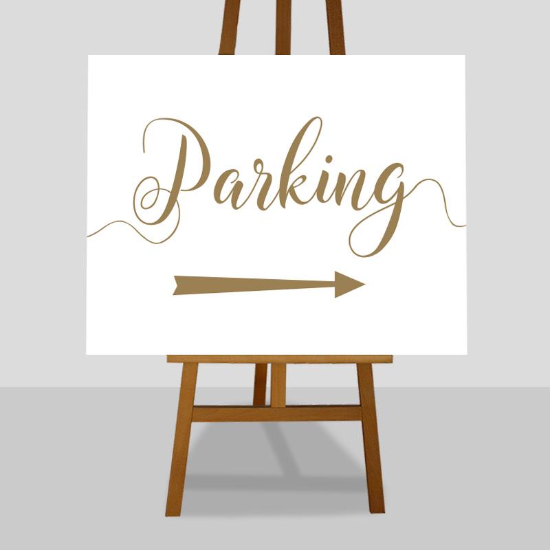 gold parking sign with directional arrows