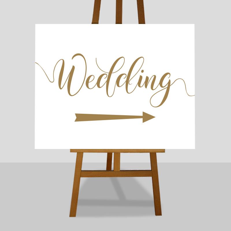 printable gold wedding arrow sign on an easel