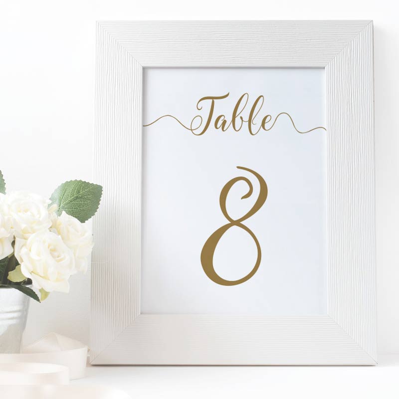 gold wedding table number in a white frame