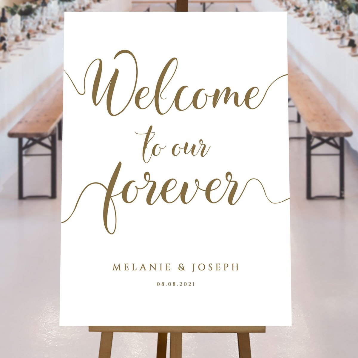 gold welcome to our forever sign at a rustic wedding