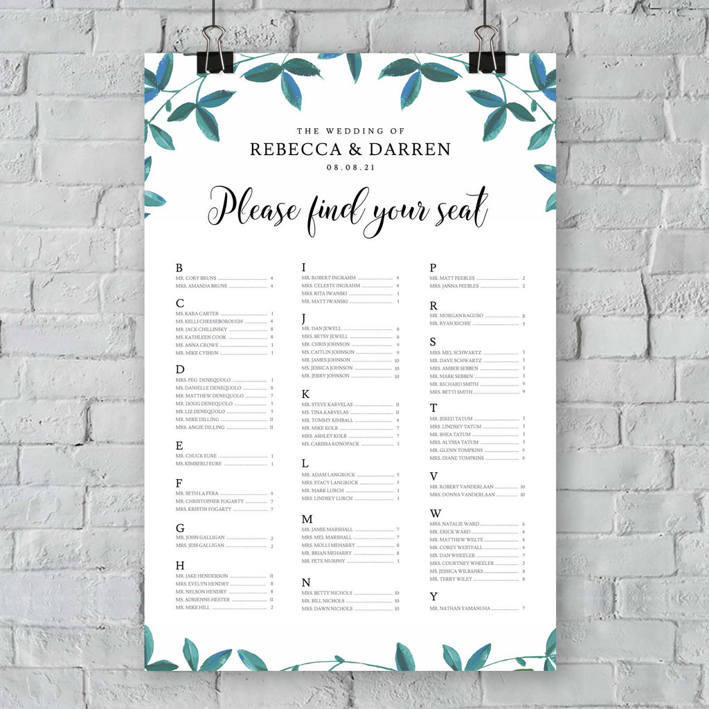 green foliage alphabetical find your seat sign hanging from a wall