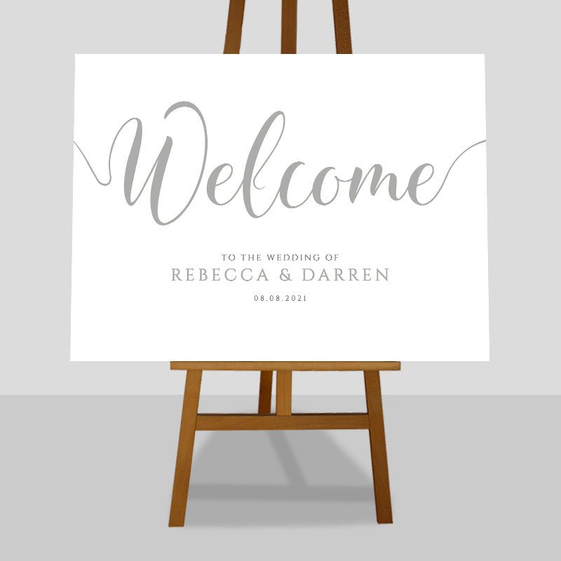 grey wedding welcome sign on an easel
