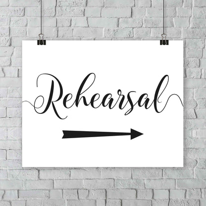 printed wedding rehearsal sign at an outdoor wedding