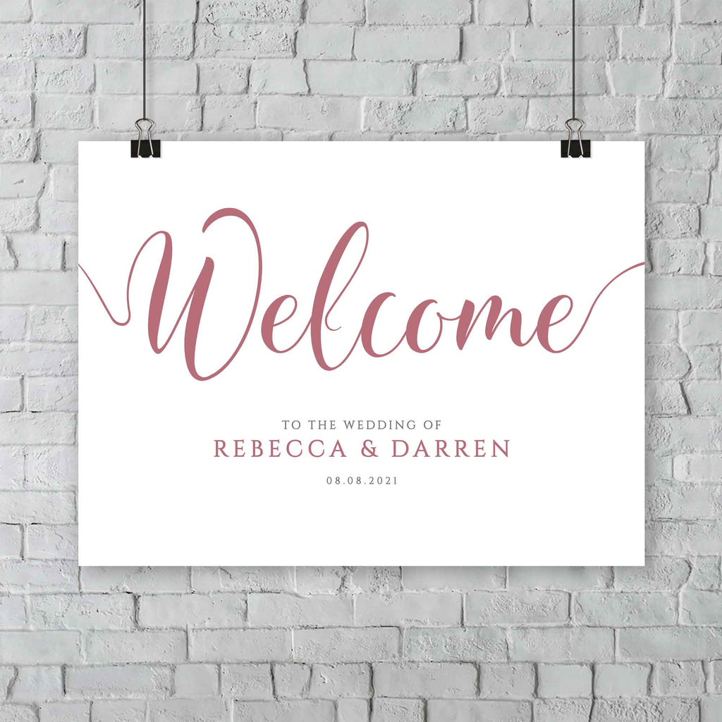 hanging dusty pink welcome signage