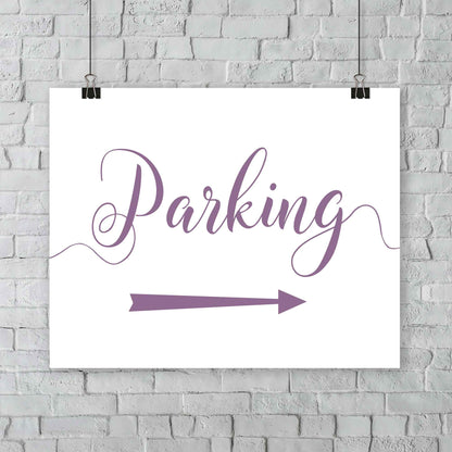 lavender purple parking lot arrow sign hanging from a wall