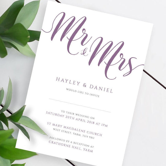 lavender purple wedding invitation template on a white table