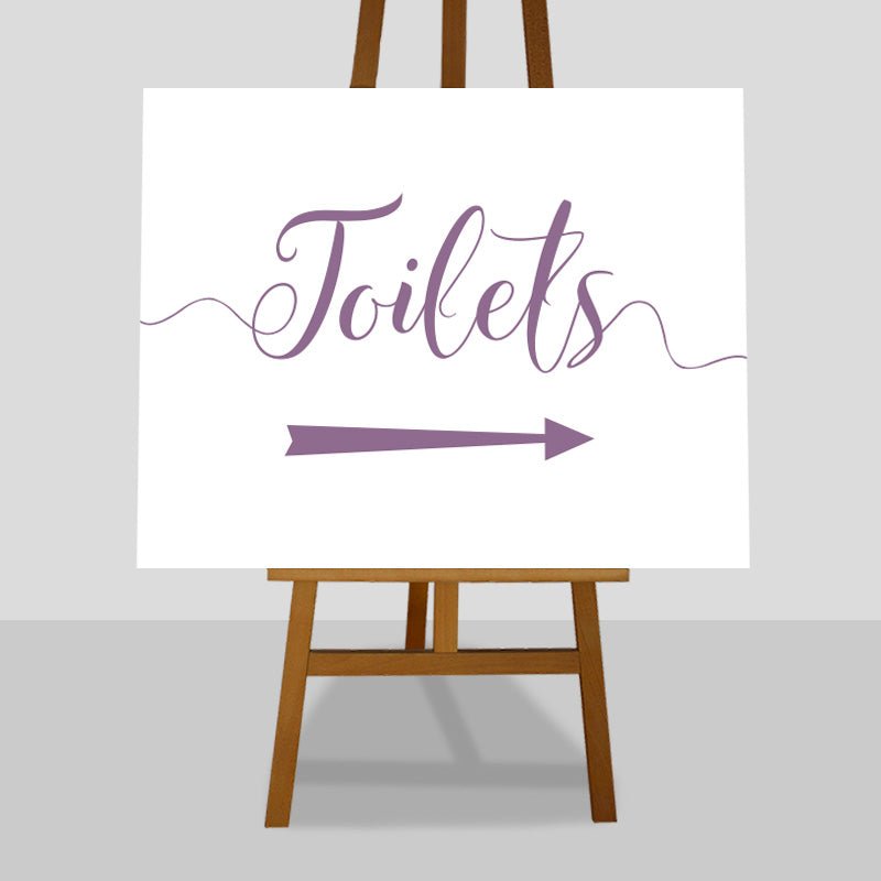 lavender purple wedding toilets arrow sign on an easel