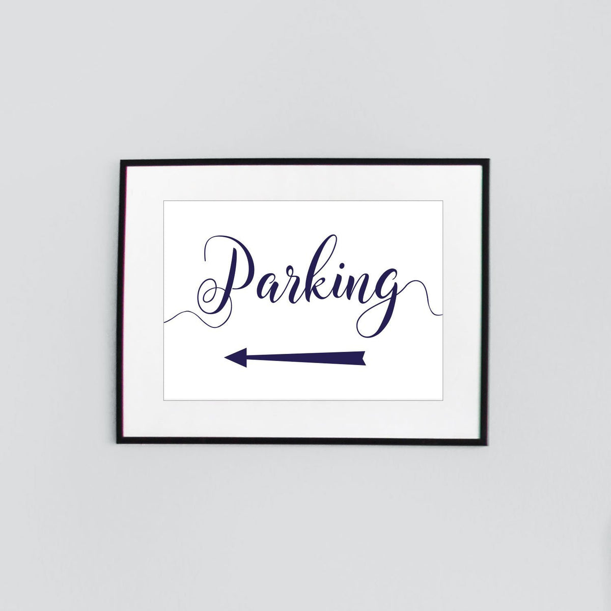 navy parking sign with left arrow framed print