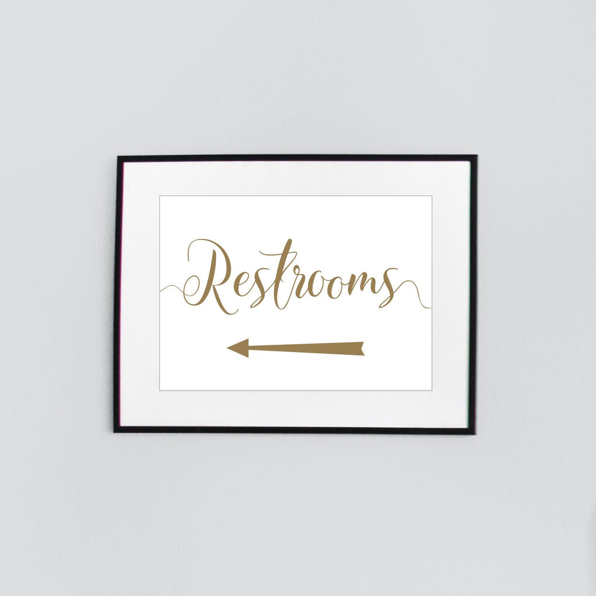 printable gold restrooms sign with left arrow