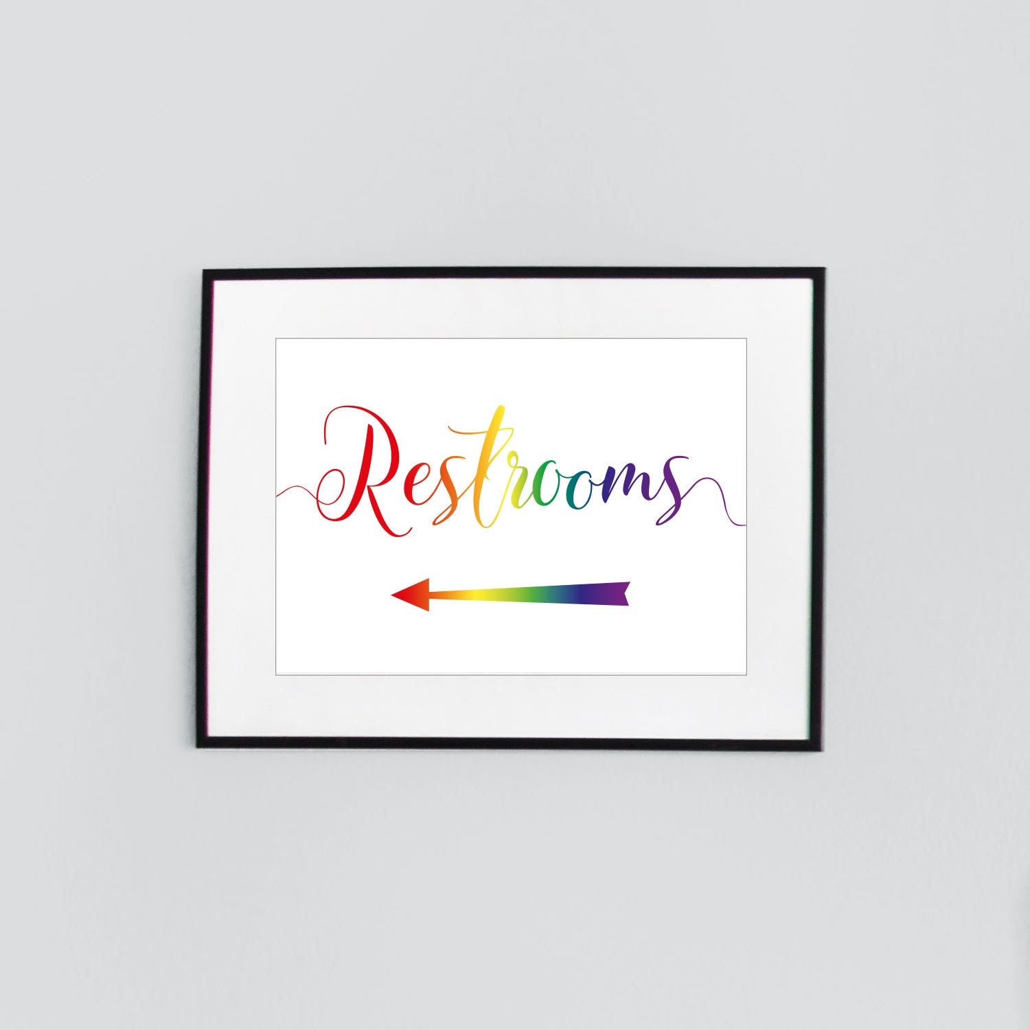 pride rainbow restrooms sign at a gay wedding