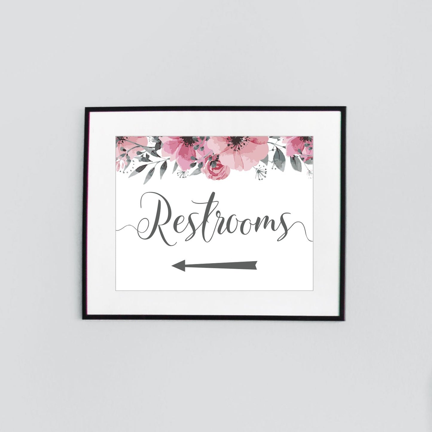 framed wedding restrooms sign with left arrow to point guests in the right direction