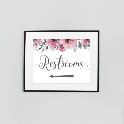 framed wedding restrooms sign with left arrow to point guests in the right direction