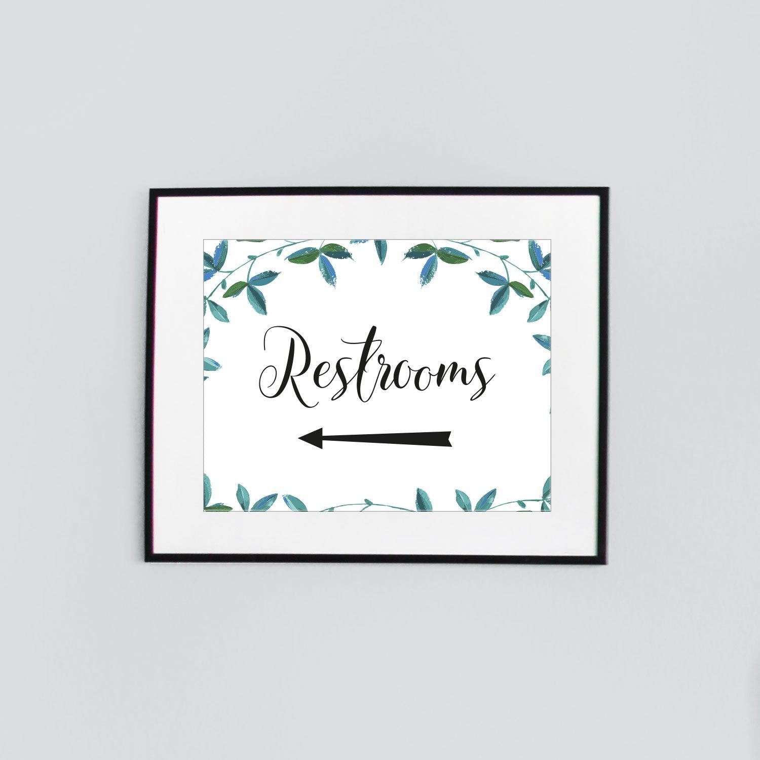 restrooms this way left arrow wedding sign with green foliage design