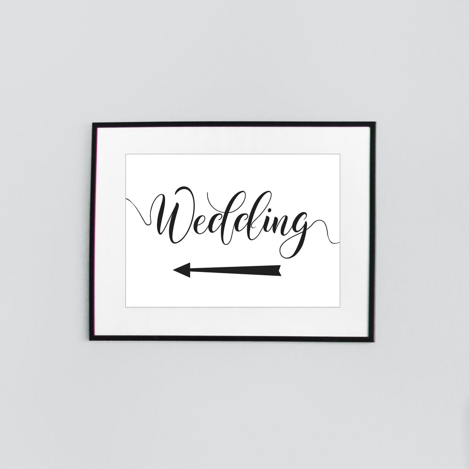 wedding signage with a left arrow framed print