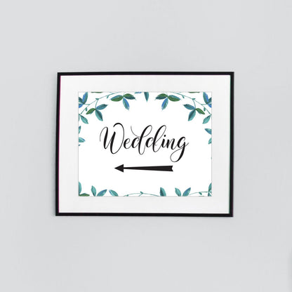 Printable A3 wedding arrow sign with green leaves border in a picture frame