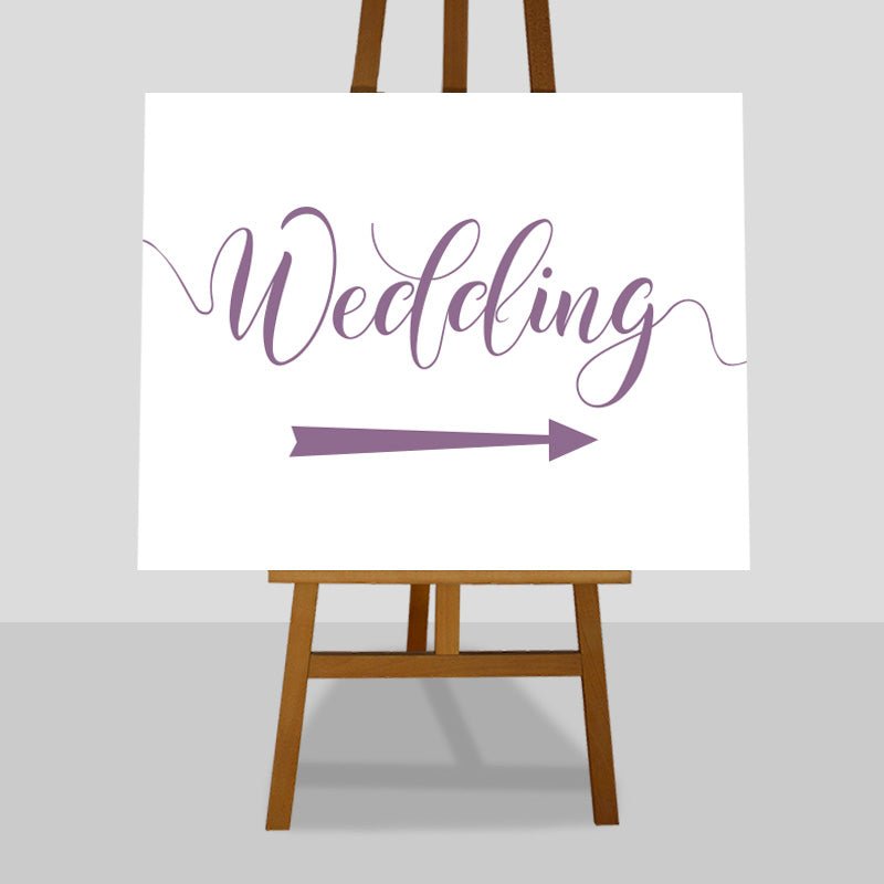 lilac purple wedding arrow sign on easel