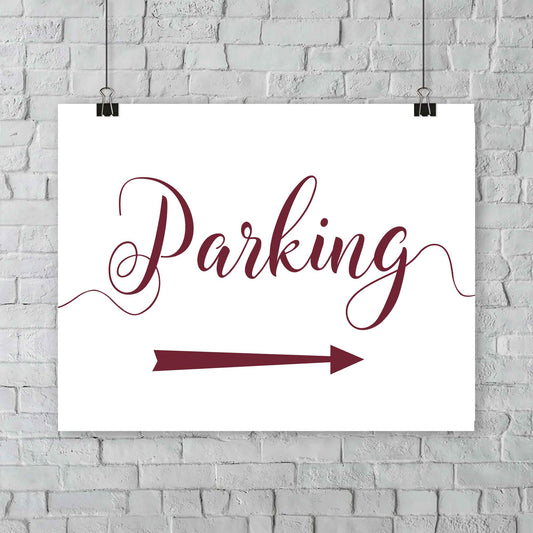 maroon parking lot arrow sign hanging from a wall
