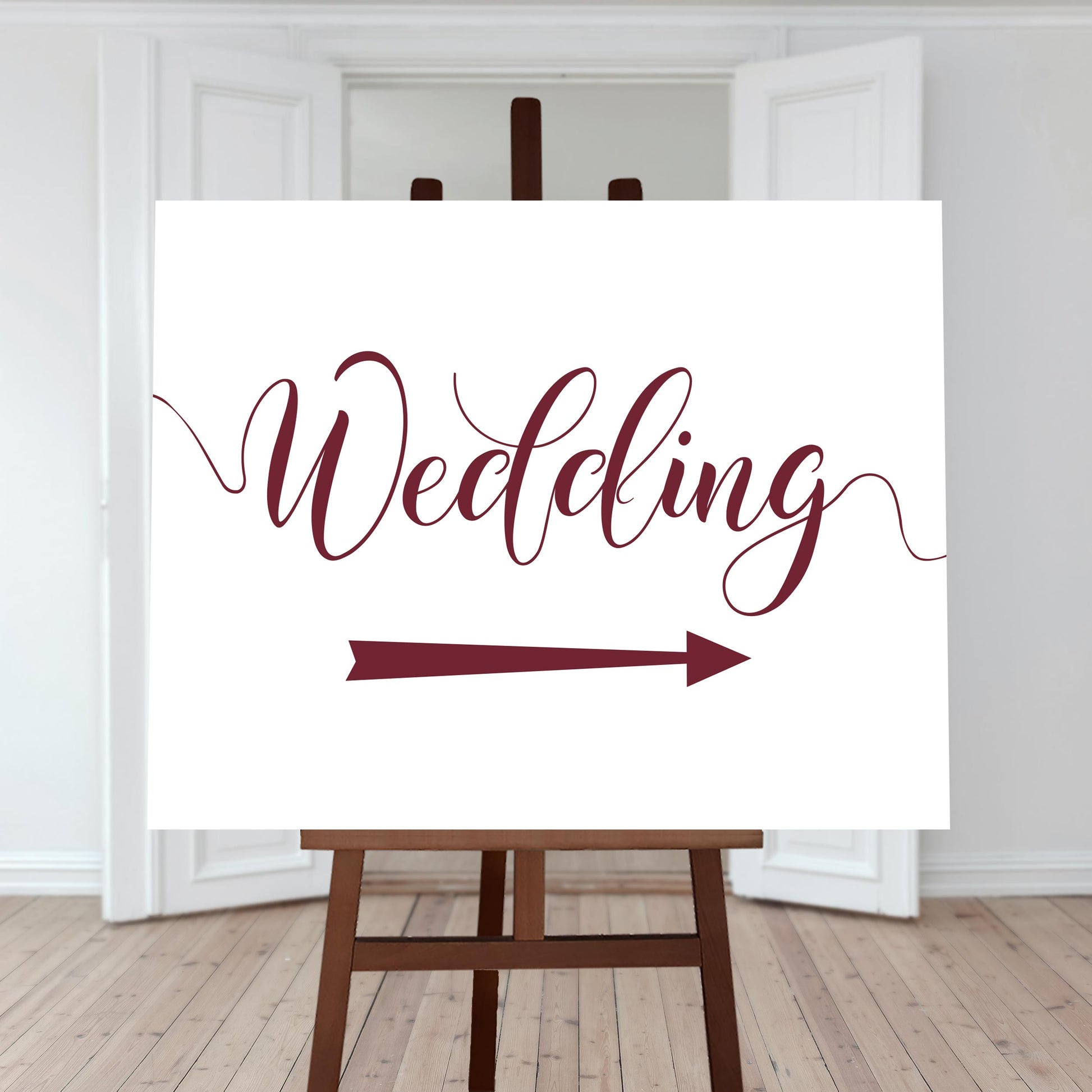 maroon wedding directions sign with a right arrow