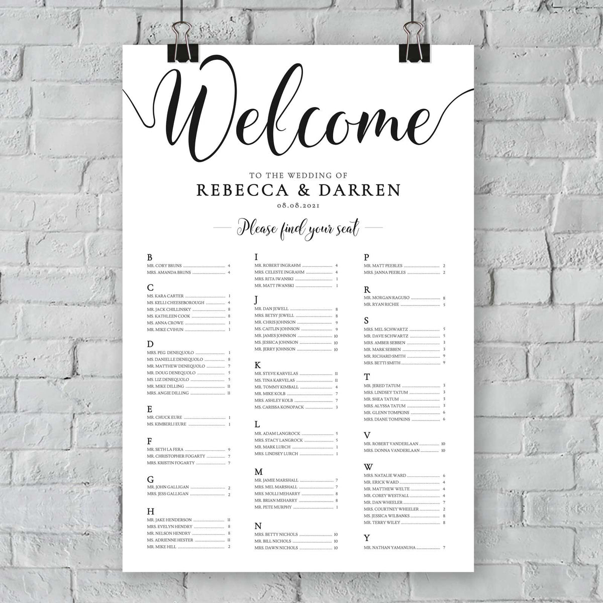 minimalist alphabetical seating chart hanging from a wall