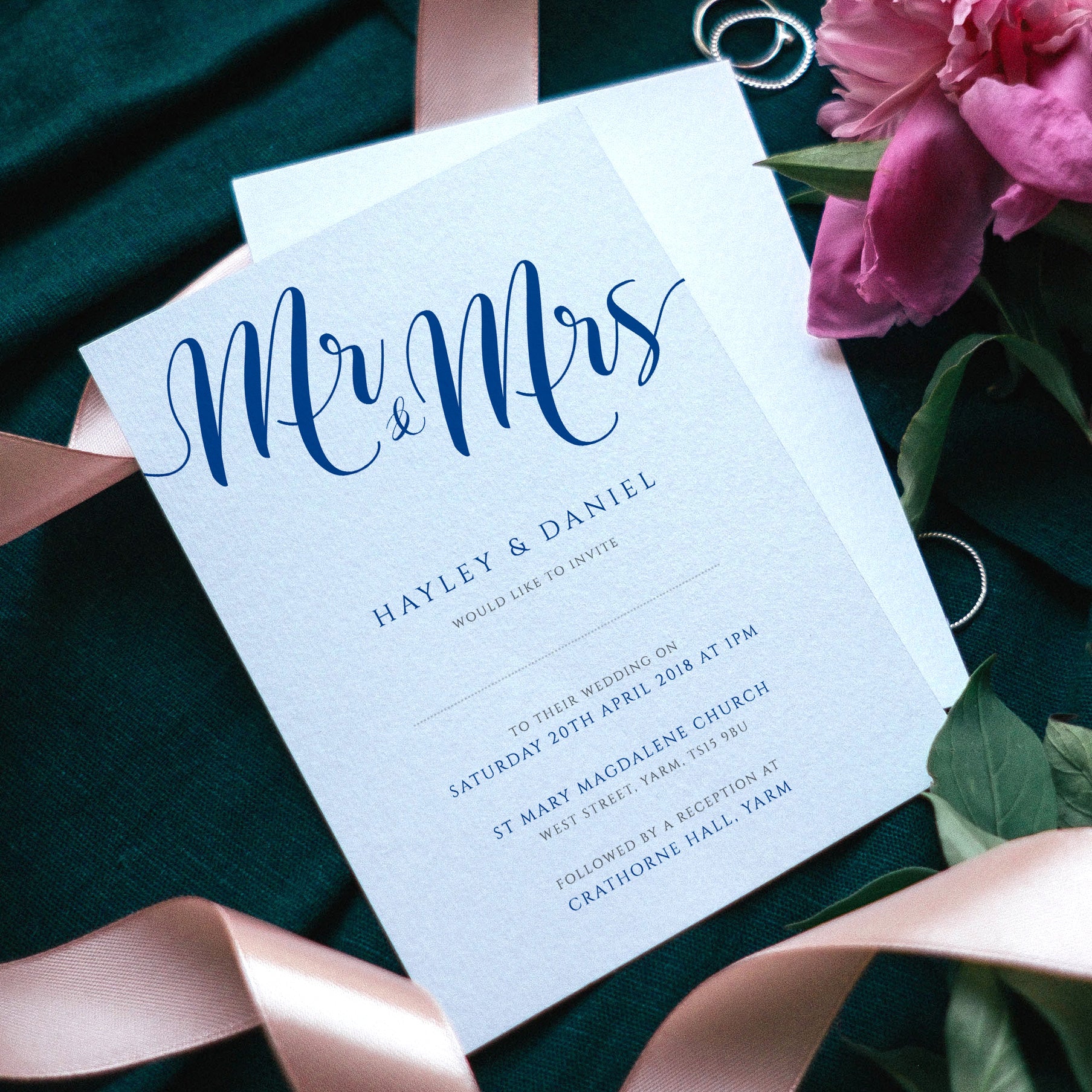 mr and mrs ocean blue wedding invitations with flowers and ribbons