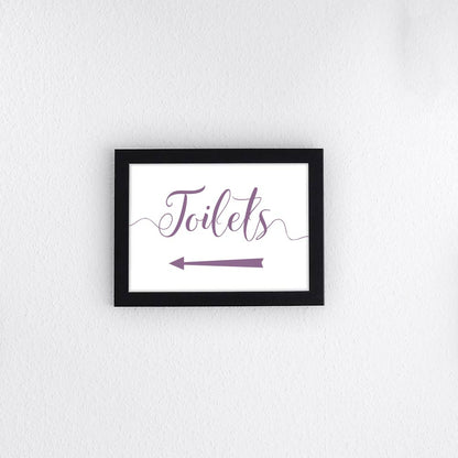 mulberry purple directional toilets sign with left arrow printed and framed