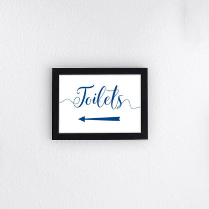 nautical blue directional toilets sign with left arrow printed and framed