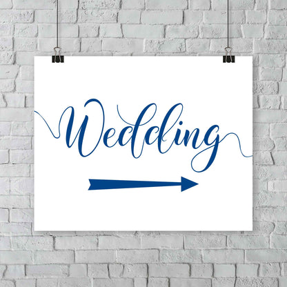 nautical blue wedding arrow sign print hanging from a wall