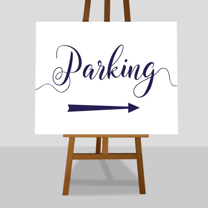 navy parking sign with directional arrow sign