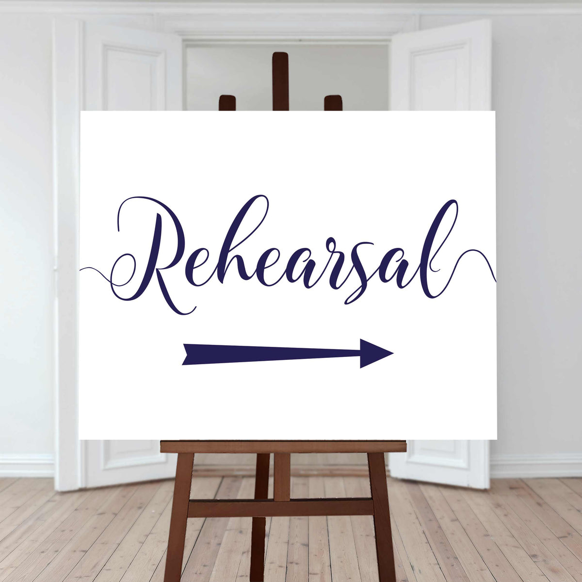 navy wedding rehearsal arrow sign