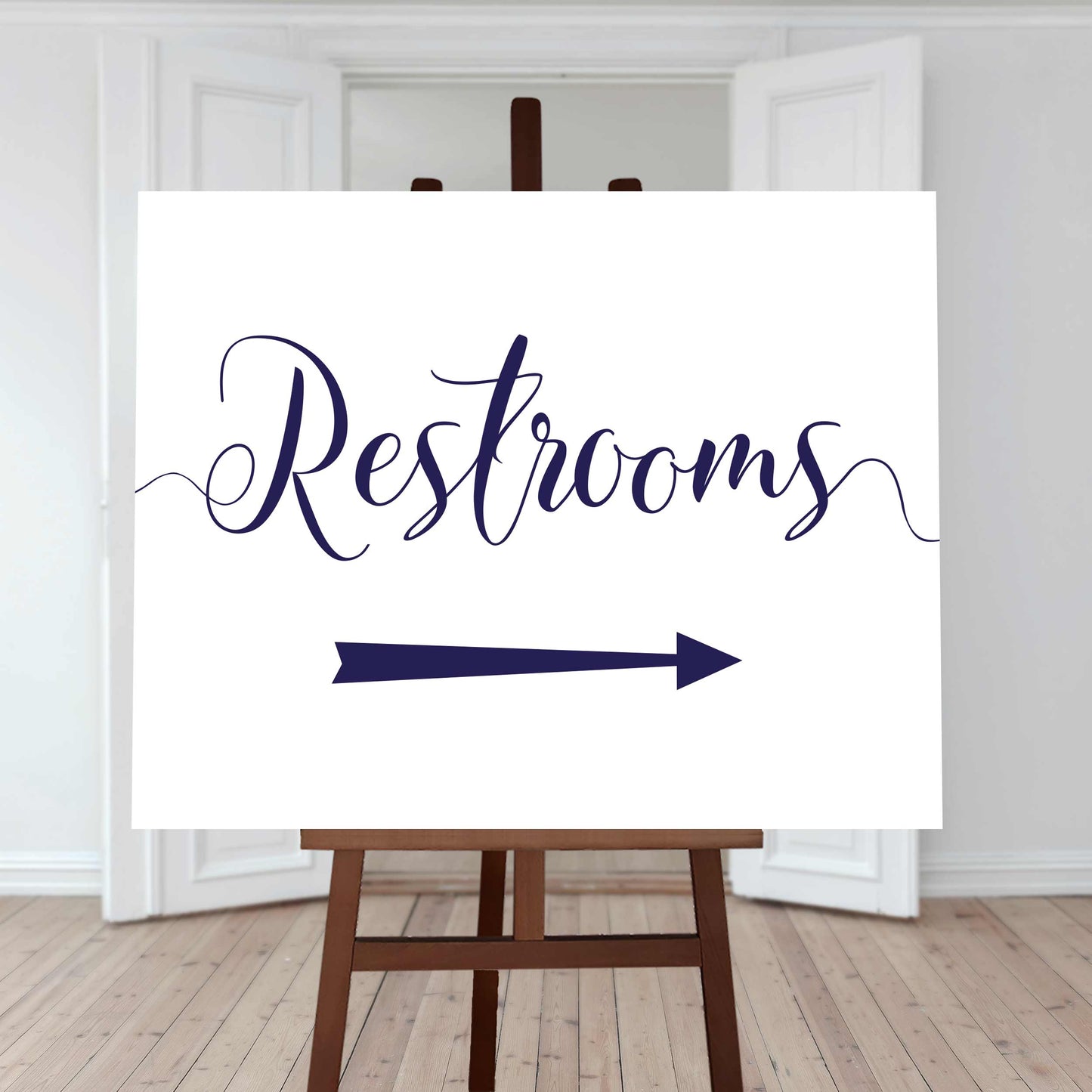 navy restrooms sign with directional arrow