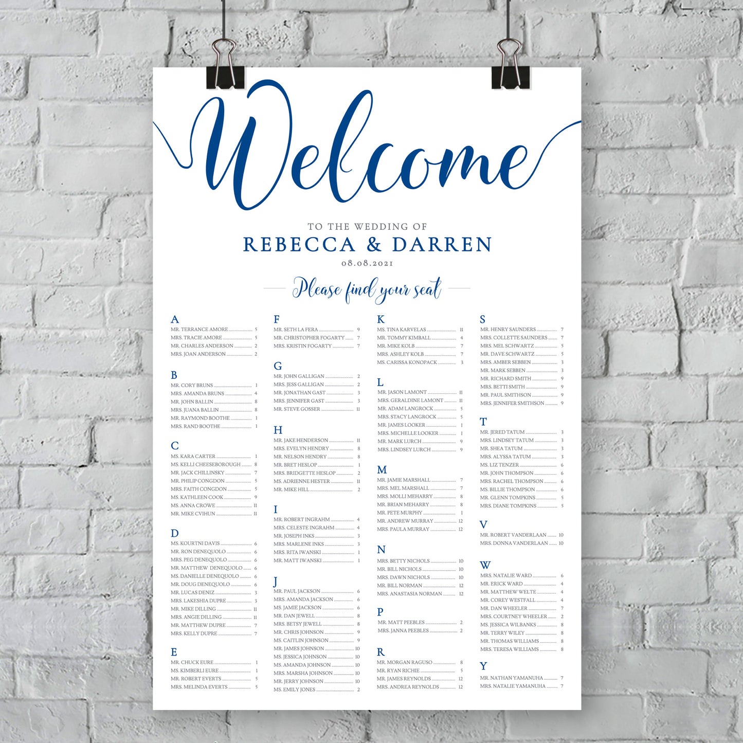 outdoor wedding royal blue seating chart on wall