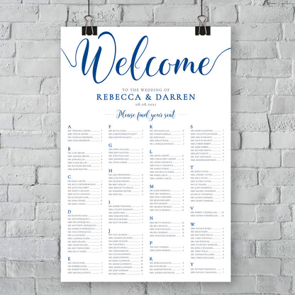 outdoor wedding royal blue seating chart on wall