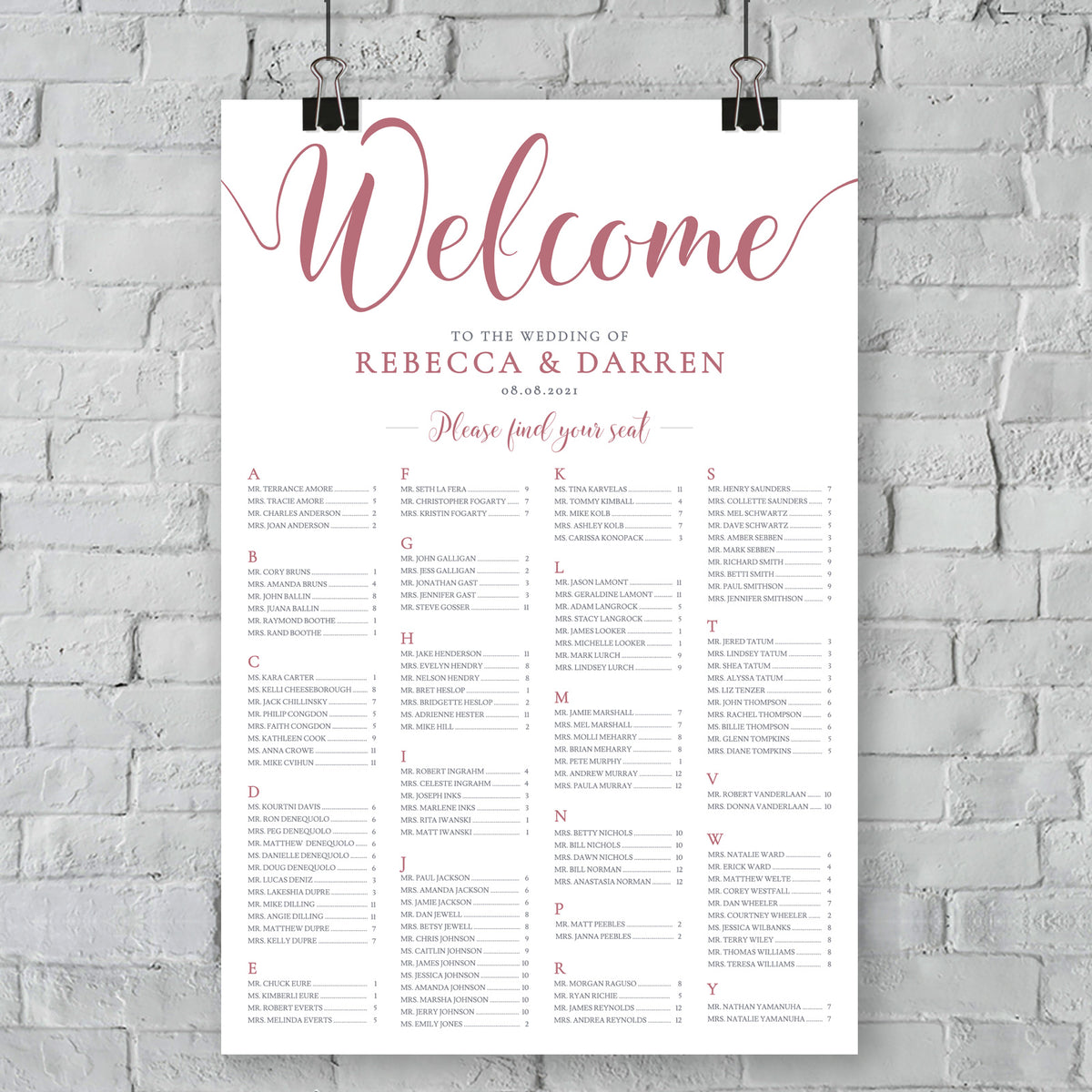 outside wedding seating chart on wall