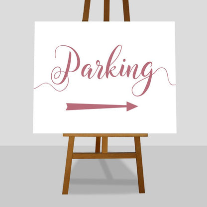 pastel pink wedding parking arrow sign on an easel