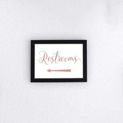 peach wedding restrooms directional arrow sign in a frame