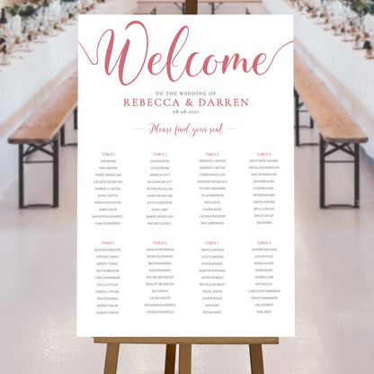 pink seating chart on an easel