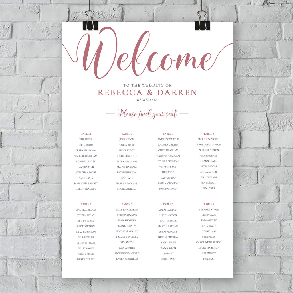 pink table plan hanging on wall