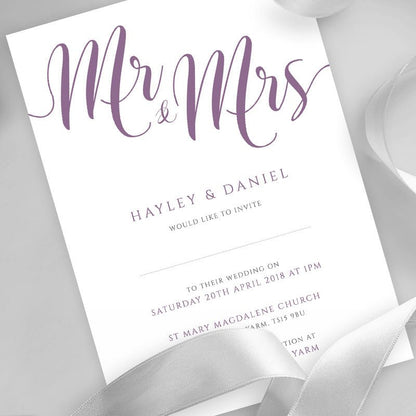 plum purple wedding invitation printed on white card with ribbons overlayed