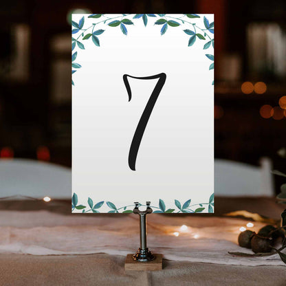 printable boho table number sign in metal stand at wedding reception